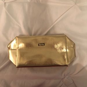 TARTE gold leather makeup bag
